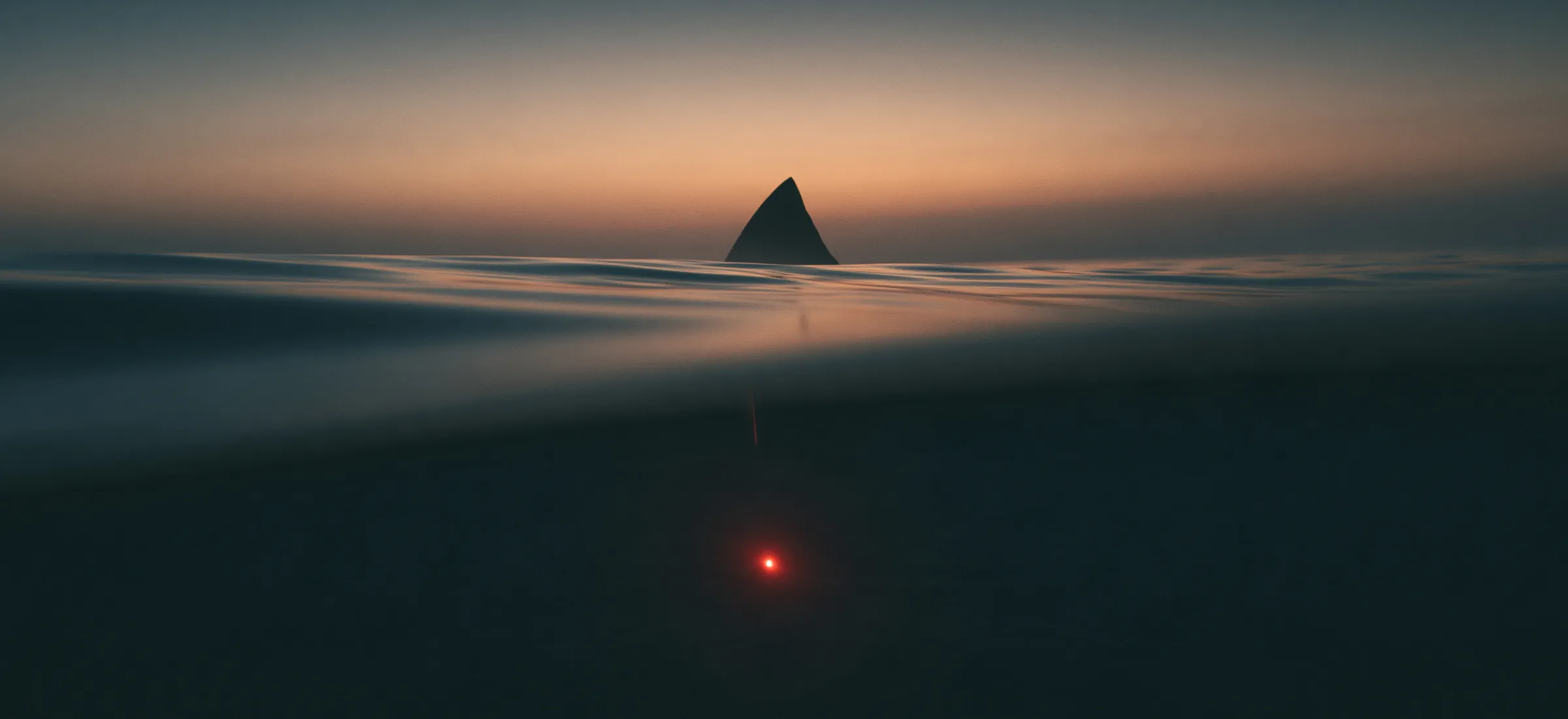 an image of a shark fin in the clouds